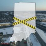 Map outline of Indiana over a cityscape with caution tape symbolizing crime awareness