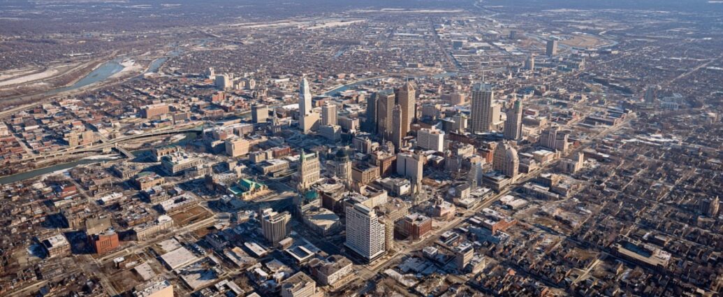 Aerial view of downtown Indianapolis with city buildings and surrounding neighborhoods