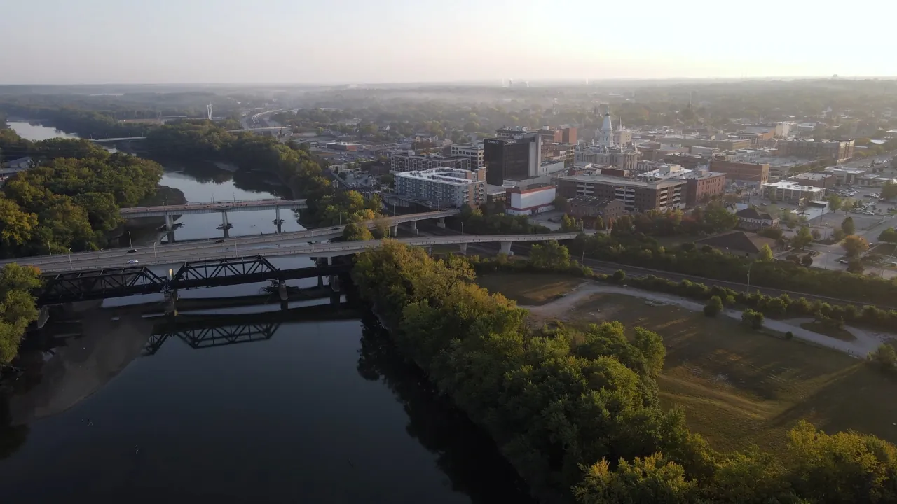 Lafayette’s skyline sits near the river and bridges at sunrise