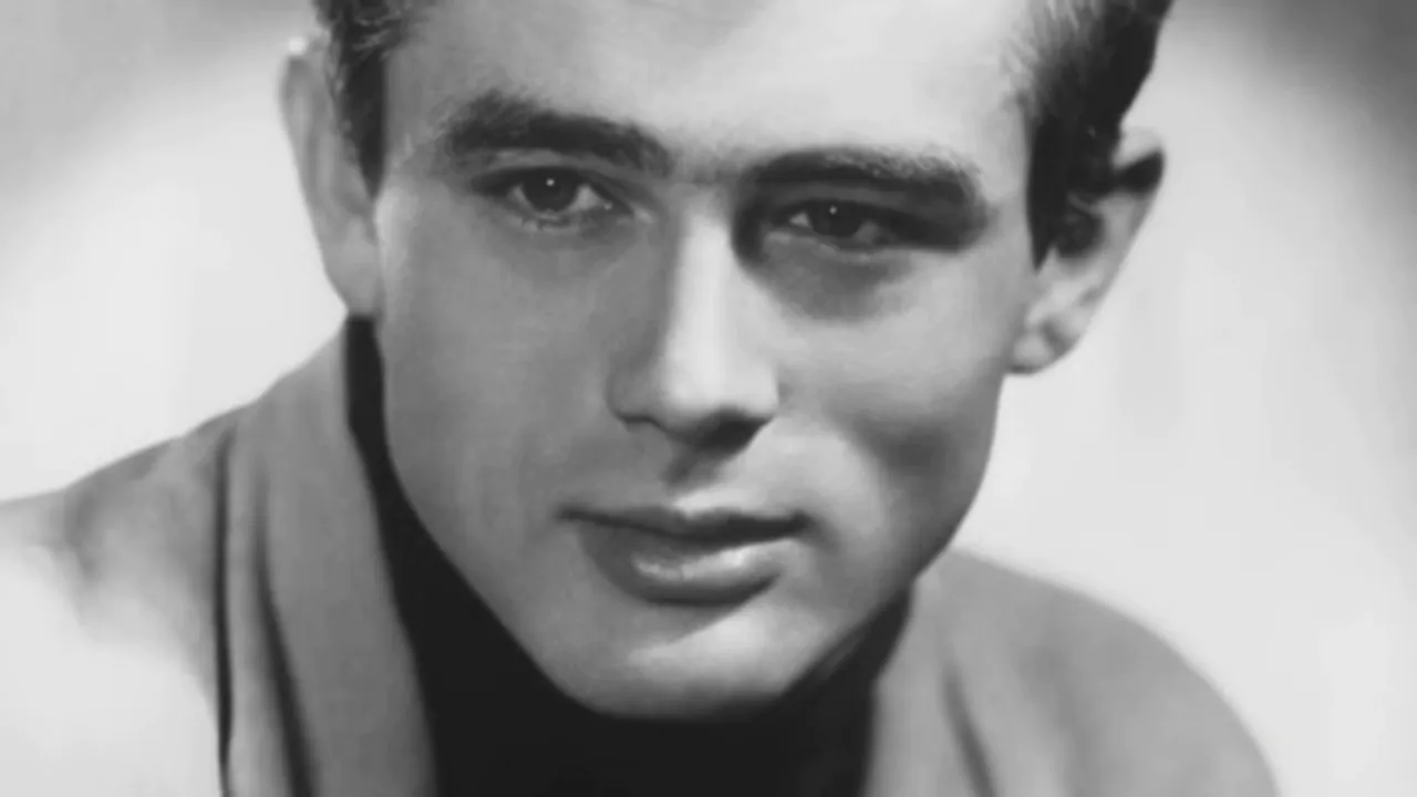 Black-and-white close-up portrait of James Dean