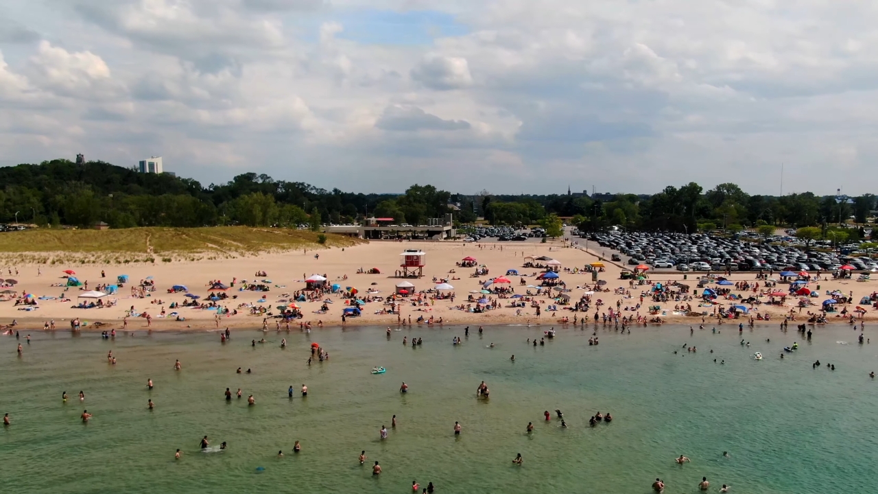 Crowds enjoy a summer day at Washington Park Beach in Michigan City