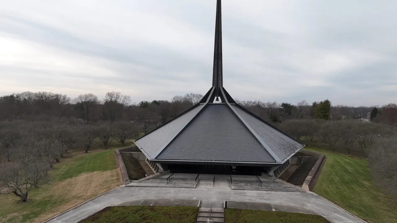 North Christian Church in Columbus, Indiana, seen with its steep roof and tall central spire